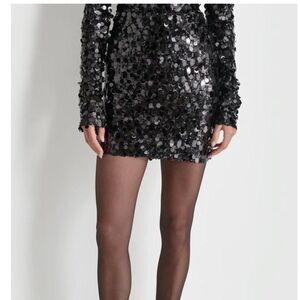 Nwot DKNY
SEQUINS AND MESH MINI SKIRT